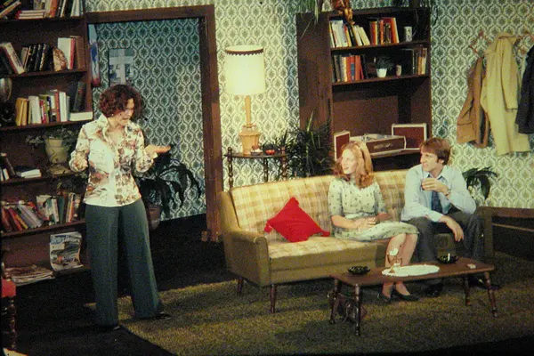 Virginia Wolf Nicolet Players play with three actors in vintage living room set.
