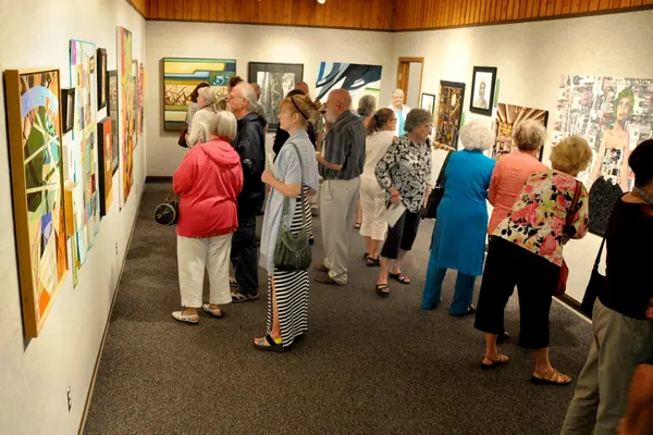 people viewing art in the nicolet art gallery