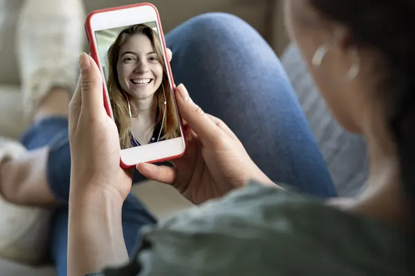 females video chatting on cell phone
