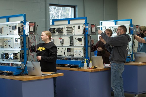 students working in electromechanical lab