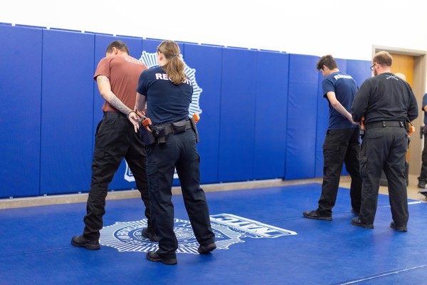 recruit academy practicing handcuff skills