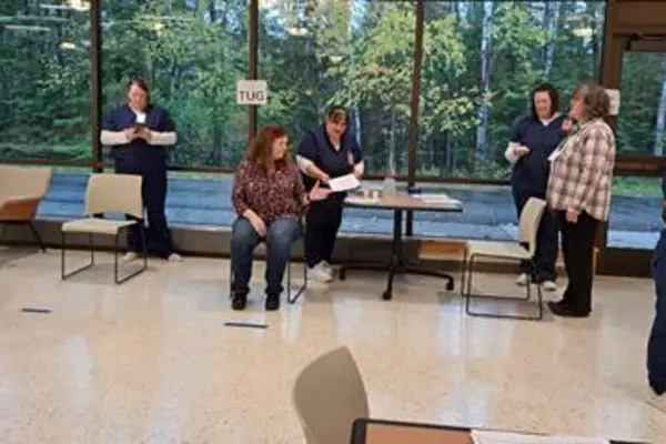 Physical therapists and Nicolet College students perform health assessments with Learning in Retirement members.