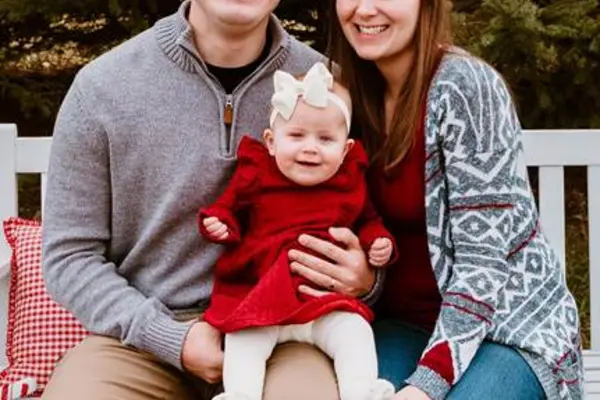 Bobi pictured with partner and daughter