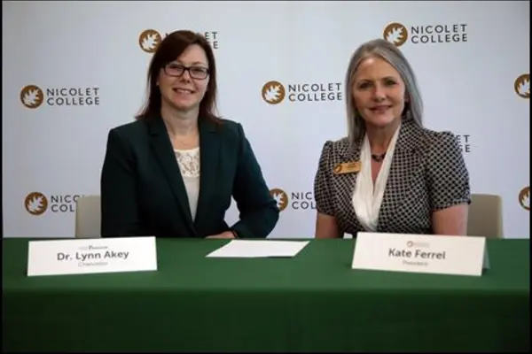 Dr. Lynn Akey, chancellor of UW-Parkside, and Kate Ferrel, president of Nicolet College, signed new articulation agreements,