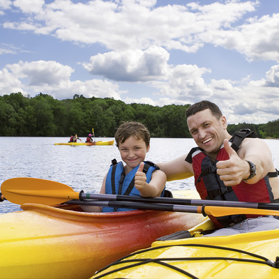 Dad with son kayaking