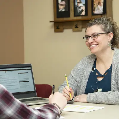 Financial Aid Advisor with student