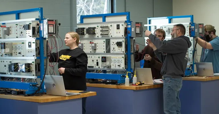 students working in electromechanical lab