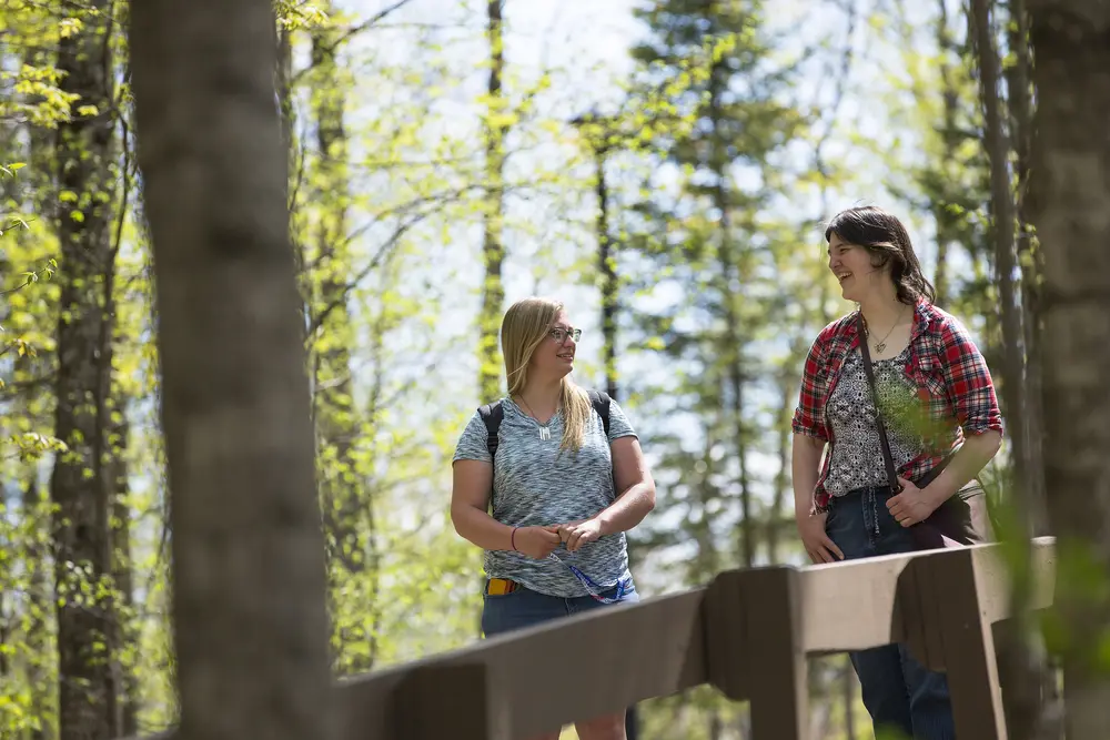Two girls walking outside in the spring