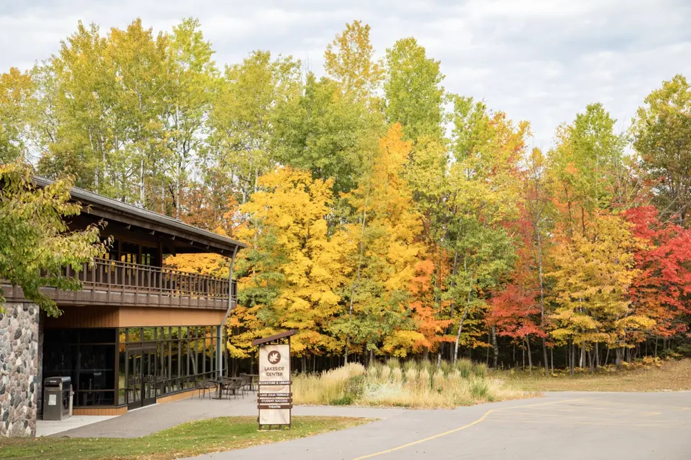 Autumn trees with vibrant yellow and red leaves near the Lakeside Center at Nicolet College.