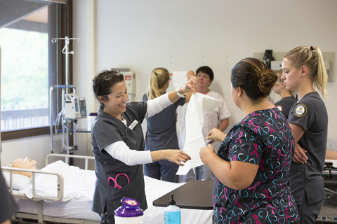 nursing students practicing with sanitary preparation
