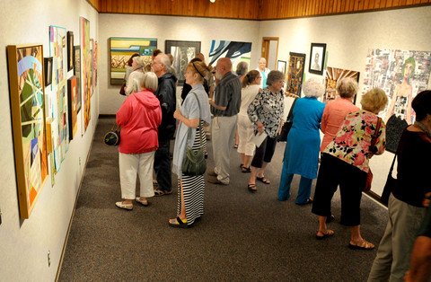 people viewing art in the nicolet art gallery