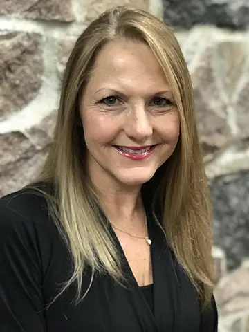 professional portrait of kate ferrel, president
