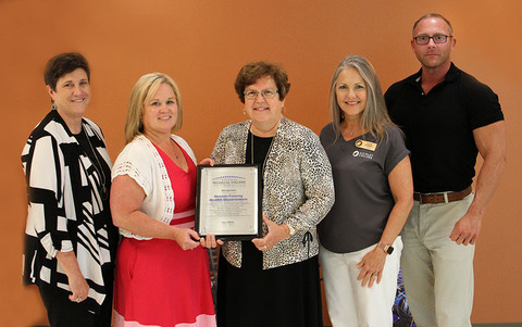 Photo of Oneida county health department staff receiving award from WTCS