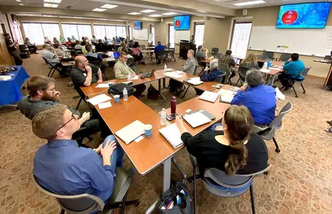 classroom of high school counselors attending a seminar