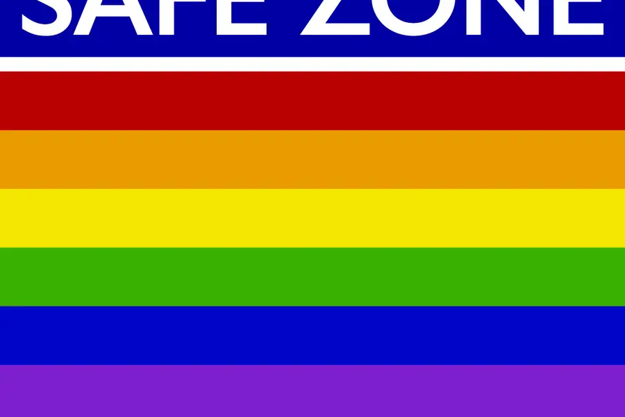 LGBTQ+ Safe Zone logo with rainbow stripes and text "Nicolet College".
